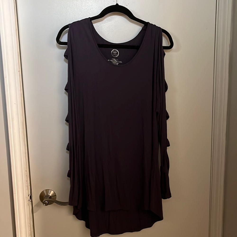 Maurice’s tunic with cut out arms